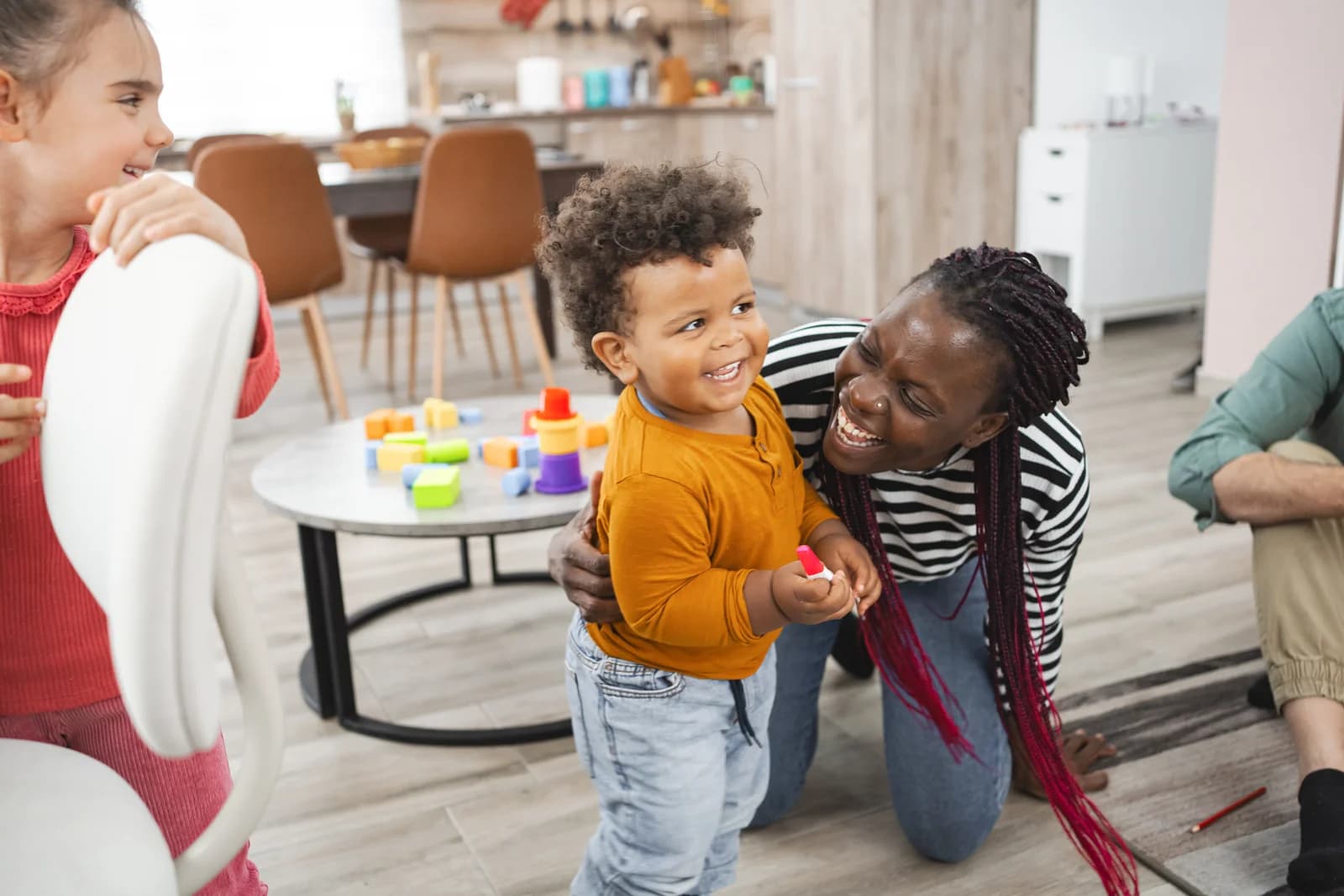 Joyful family playing together